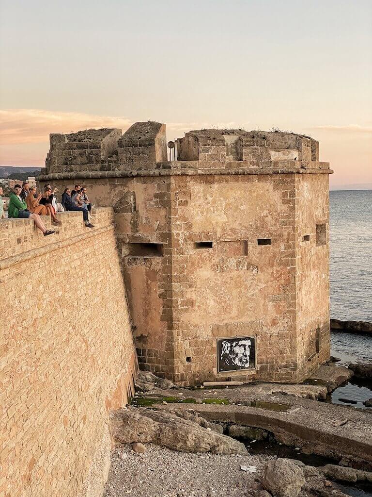 Sunset on Alghero bastions Best Airbnbs In Alghero